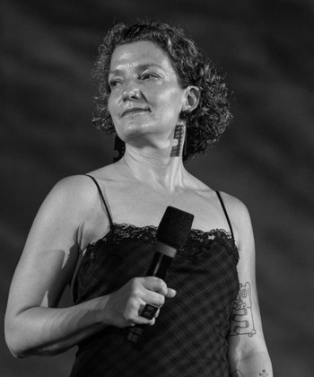 LOCARNO, SWITZERLAND - AUGUST 11: Zsuzsi Bankuti on stage before the 'The Deal' movie screening during the 78th Locarno Film Festival on August 11, 2025 in Locarno, Switzerland. (Photo by Alessandro Levati/Getty Images)
