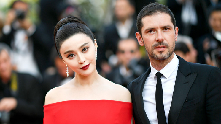 Fan Bingbing, Member of the Feature Films Jury, and Melvil Poupaud © Loic Venance / AFP