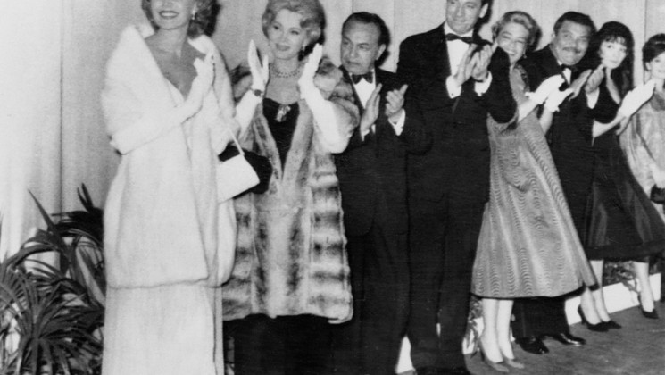 Rhonda Fleming, Zsa Zsa Gabor, Edward G. Robinson, Yves Montand, Simone Signoret, Folco Lulli, Juliette Greco © AFP