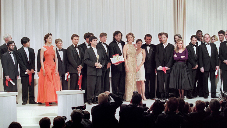 The laureates © Patrick Hertzog / AFP