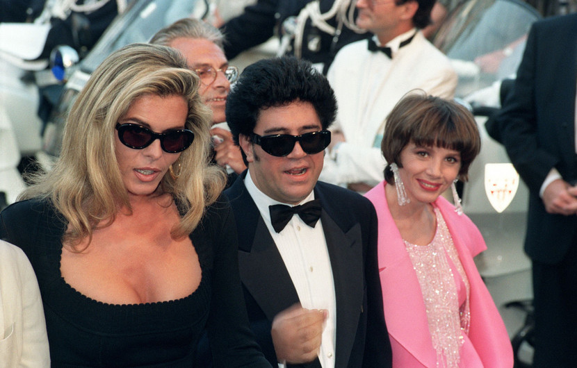 Pedro Almodóvar, member of the Feature Film Jury, accompanied by Victoria Abril and Bibi Andersen climbing the stairs for the Opening Ceremony of the 45th Festival de Cannes © Mario Goldman / AFP
