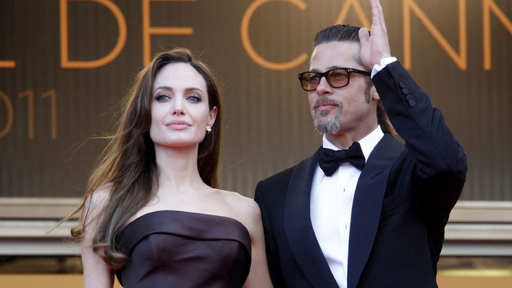 Angelina Jolie, Brad Pitt - Montée des Marches - The Tree of Life © AFP