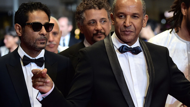 Hichem Yacoubi, Abderrahmane Sissako and Abel Jafri - Red carpet - Timbuktu © AFP