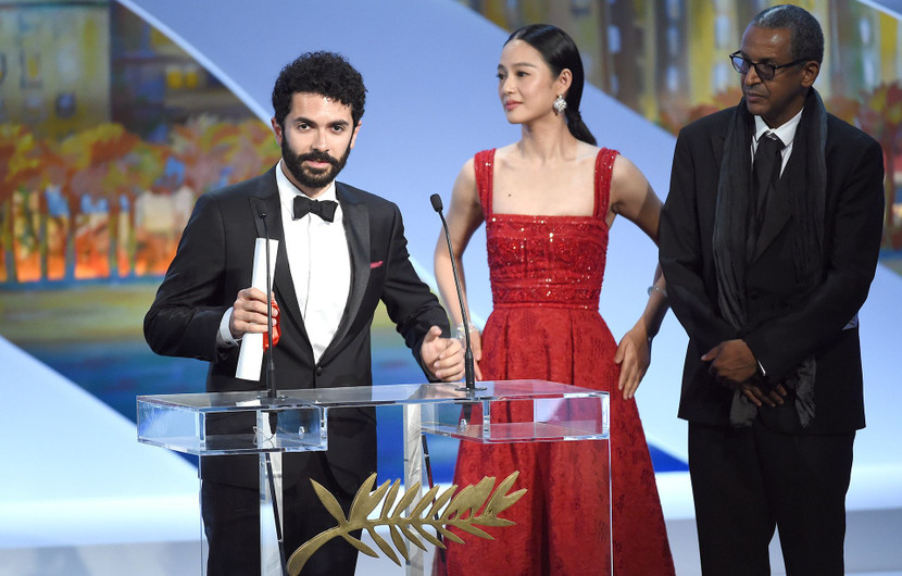 Ely Dagher, Zhou Yun et Abderrahmane Sissako - Palme d'or du court métrage - Waves' 98 © AFP / Anne-Christine Poujoulat