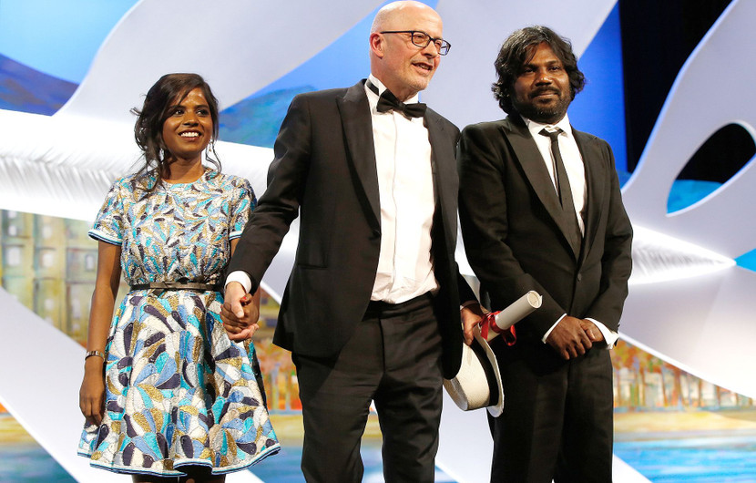 Kalieaswari Srinivasan, Jacques Audiard, Jesuthasan Antonythasa - Palme d'or - Dheepan © AFP / Valery Hache
