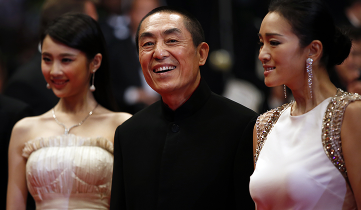 Zhang Huiwen, Zhang Yimou and Gong Li © AFP / VH