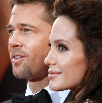 Angelina Jolie and Brad Pitt, Climbing of the Steps of the film The Exchange © AFP