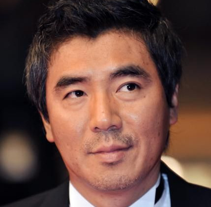 Kim Jee-Woon, Climbing of the Steps of the film The Good, the Bad, the Weird © AFP