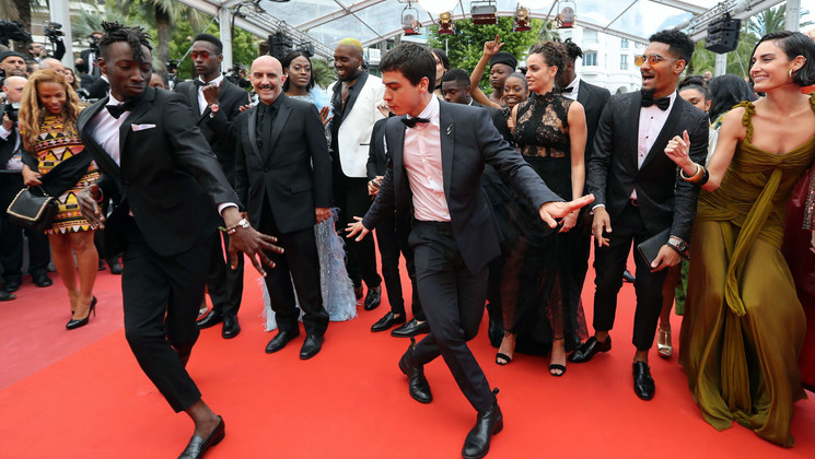 Gaspar Noé and the team of Climax before the screening of   BlacKkKlansman © Valery Hache/AFP