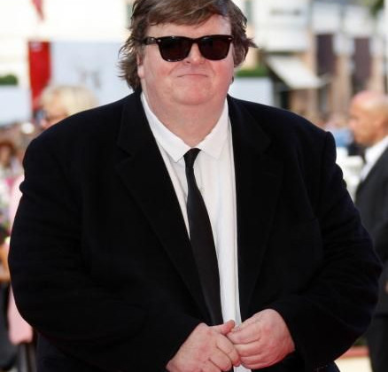 Michael Moore, Climbing of the Steps of the film Indiana Jones © AFP