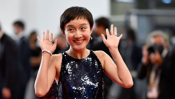 Huang Miyi - Gaey Wa’r (Streetwise) © John Macdougall / AFP