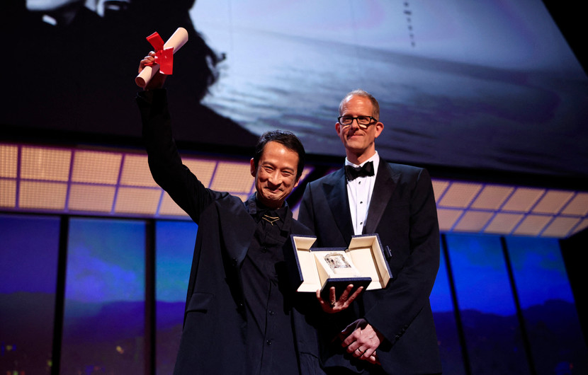 Tran Anh Hung & Pete Docter - THE POT-AU-FEU, Best director © VALERY HACHE / AFP
