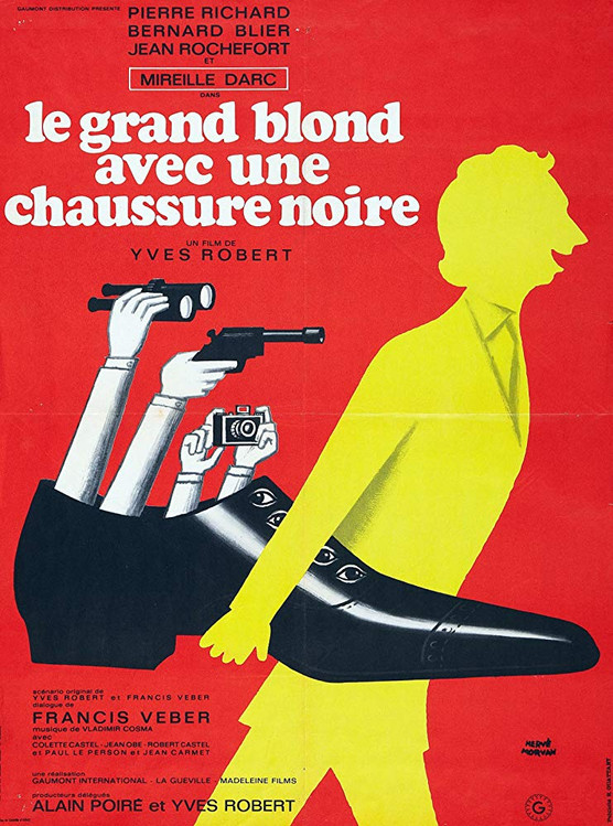 LE GRAND BLOND AVEC UNE CHAUSSURE NOIRE © DR