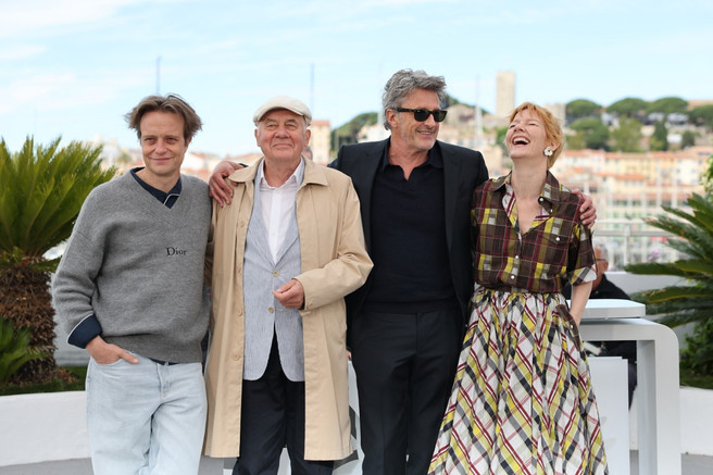 (From L) German actor August Diehl, German actor Hanns Zischler, Polish director and screenwriter Pawel Pawlikowski and German actress Sandra Huller pose during a photocall of the film "Fatherland" at the 79th edition of the Cannes Film Festival in Cannes, southern France on May 15, 2026. (Photo by Thibaud MORITZ / AFP) © Thibaud MORITZ / AFP