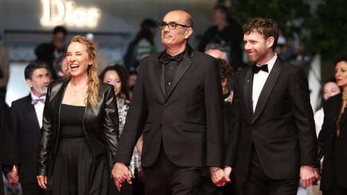 (From L) French actress Emmanuelle Bercot, French director and screenwriter Vincent Garenq and French actor Antoine Reinartz arrive for the screening of the film "L'Abandon" at the 79th edition of the Cannes Film Festival in Cannes, southern France on May 13, 2026. (Photo by Thibaud MORITZ / AFP)